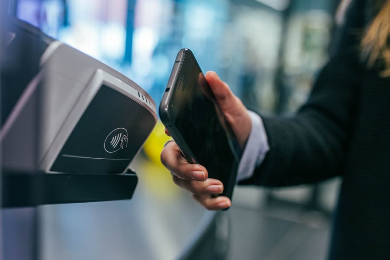Tapping a phone to a contactless NFC reader