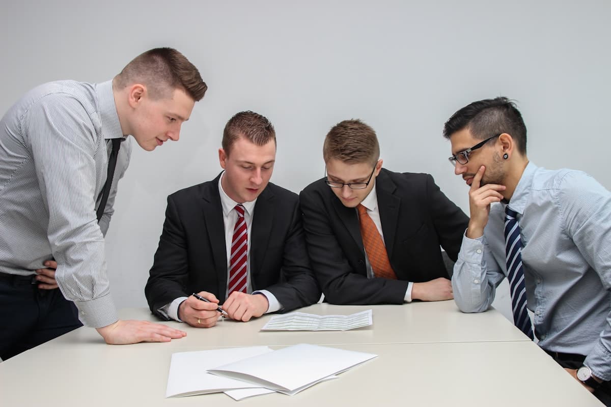 Team reviewing compliance documentation